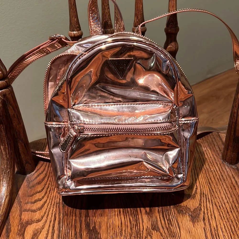 Guess Faux Leather Small  Backpack In A Shiny Rose Gold Colored